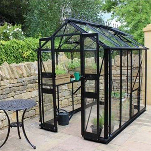 Greenhouse tal-ħġieġ tal-bitħa tad-dar